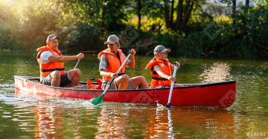 joyful family canoeing on a calm river at summer mother and daughter paddling at front, father at the back in germany. Family on kayak ride. Wild nature and water fun on summer vacation.  : Stock Photo or Stock Video Download rcfotostock photos, images and assets rcfotostock | RC Photo Stock.: