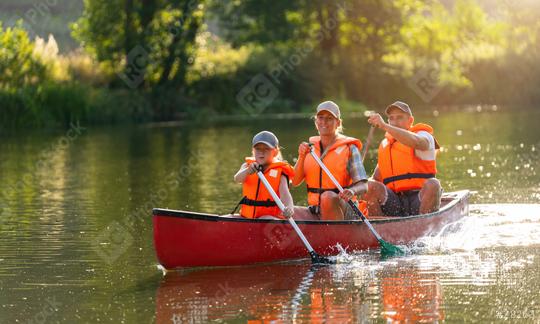 Joyful family of three canoeing on a calm river, with splashing water and lush greenery illuminated by sunlight at summer in bavaria, germany. Family on kayak ride. Wild nature and water fun on summer  : Stock Photo or Stock Video Download rcfotostock photos, images and assets rcfotostock | RC Photo Stock.: