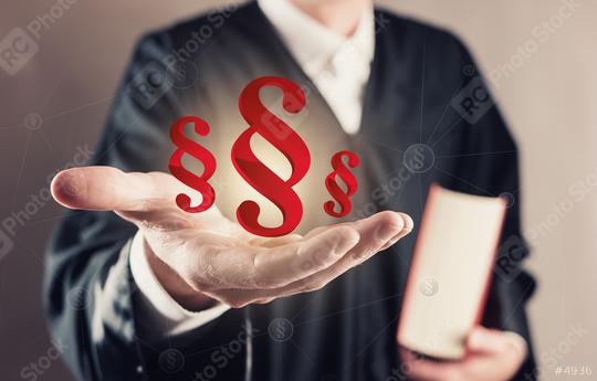 judge holding paragraph sign and book - law concept image  : Stock Photo or Stock Video Download rcfotostock photos, images and assets rcfotostock | RC Photo Stock.: