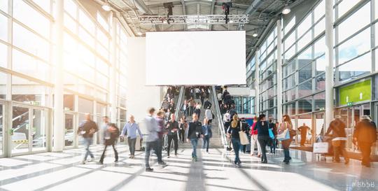 large crowd of anonymous blurred people at a trade show, including copy space banner   : Stock Photo or Stock Video Download rcfotostock photos, images and assets rcfotostock | RC Photo Stock.: