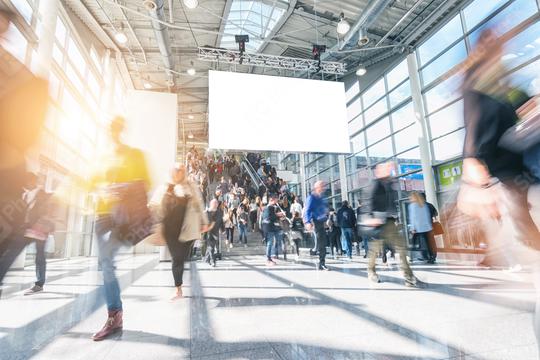 large crowd of anonymous blurred people walking at a trade show  : Stock Photo or Stock Video Download rcfotostock photos, images and assets rcfotostock | RC Photo Stock.:
