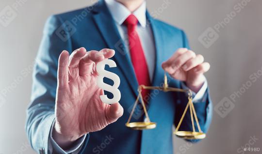 lawyer holding libra with paragraph symbol - law concept image  : Stock Photo or Stock Video Download rcfotostock photos, images and assets rcfotostock | RC Photo Stock.:
