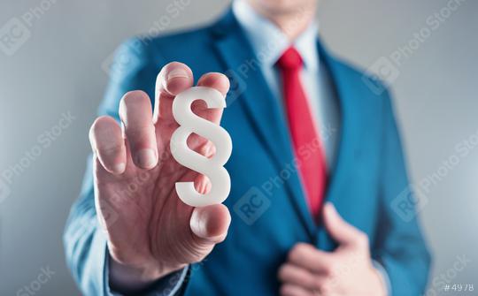lawyer holding paragraph sign - law concept image  : Stock Photo or Stock Video Download rcfotostock photos, images and assets rcfotostock | RC Photo Stock.: