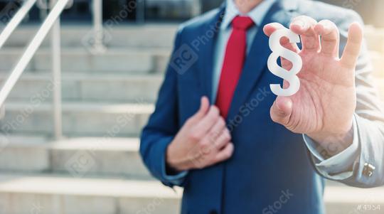 lawyer holding paragraph sign  : Stock Photo or Stock Video Download rcfotostock photos, images and assets rcfotostock | RC Photo Stock.: