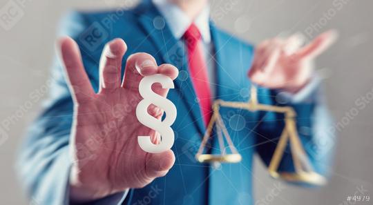 lawyer holding scale with paragraph sign - law concept image  : Stock Photo or Stock Video Download rcfotostock photos, images and assets rcfotostock | RC Photo Stock.: