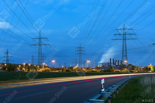 Light trails at night on a brown cole power station electricity Pylon landscape  : Stock Photo or Stock Video Download rcfotostock photos, images and assets rcfotostock | RC Photo Stock.: