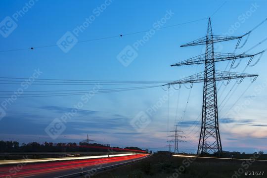 Light trails at night on a Highway electricity Pylon landscape  : Stock Photo or Stock Video Download rcfotostock photos, images and assets rcfotostock | RC Photo Stock.: