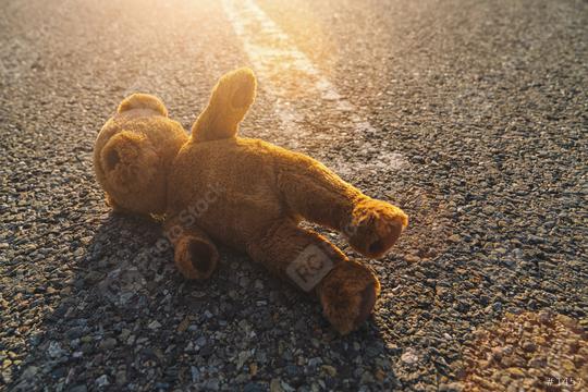 Lost teddy bear lying on the street  : Stock Photo or Stock Video Download rcfotostock photos, images and assets rcfotostock | RC Photo Stock.: