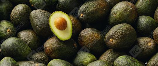Lots of avocados with halved avocado with seeds in a pile, vegan food  : Stock Photo or Stock Video Download rcfotostock photos, images and assets rcfotostock | RC Photo Stock.: