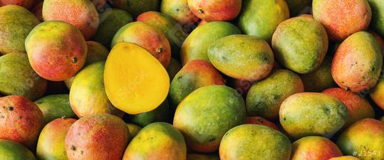Lots of mangoes with halved mangoes in a pile  : Stock Photo or Stock Video Download rcfotostock photos, images and assets rcfotostock | RC Photo Stock.: