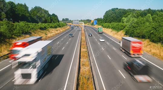 Lots of Trucks and cars on a Highway - transportation concept  : Stock Photo or Stock Video Download rcfotostock photos, images and assets rcfotostock | RC Photo Stock.: