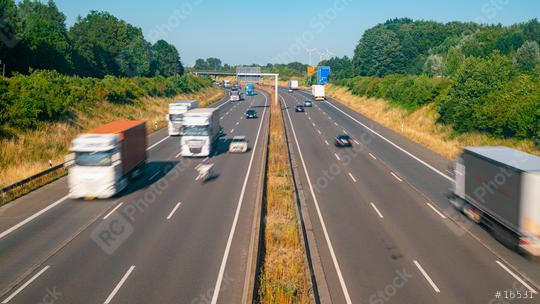 Lots of Trucks and cars on a Highway - transportation concept  : Stock Photo or Stock Video Download rcfotostock photos, images and assets rcfotostock | RC Photo Stock.: