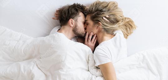 Love story. couple kissing lying on the bed in a light room at the morning. Love, happiness, family. Top view shot  : Stock Photo or Stock Video Download rcfotostock photos, images and assets rcfotostock | RC Photo Stock.: