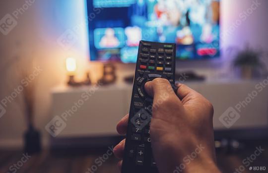 Male hand holding TV remote control. Point of view shot  : Stock Photo or Stock Video Download rcfotostock photos, images and assets rcfotostock | RC Photo Stock.: