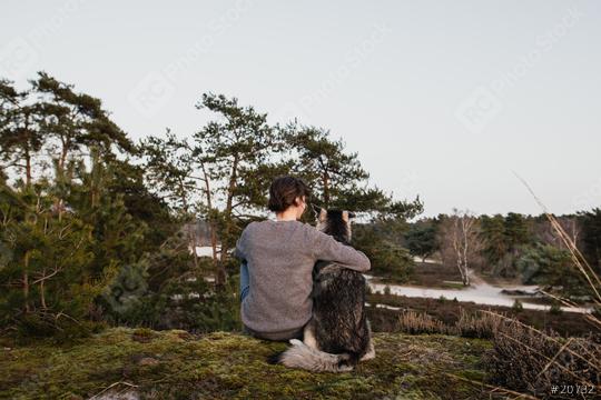 Man and dog from behind. The woman hugs the husky. You have a great view of beautiful, relaxing nature. You enjoy freedom.  : Stock Photo or Stock Video Download rcfotostock photos, images and assets rcfotostock | RC Photo Stock.: