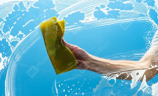 man cleaning a window with yellow cloth  : Stock Photo or Stock Video Download rcfotostock photos, images and assets rcfotostock | RC Photo Stock.:
