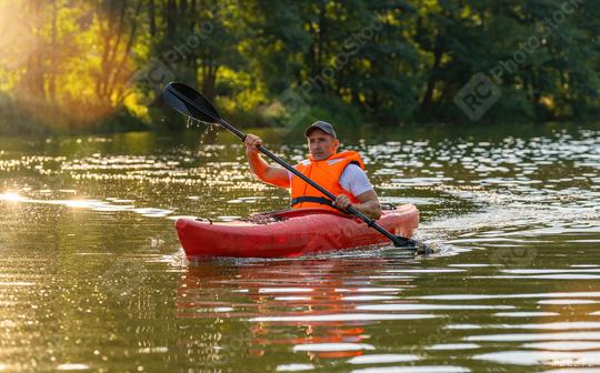 man driving with kayak on forest river  : Stock Photo or Stock Video Download rcfotostock photos, images and assets rcfotostock | RC Photo Stock.: