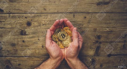 man hands holding a lot of Bitcoin coins, top view, with copy space  : Stock Photo or Stock Video Download rcfotostock photos, images and assets rcfotostock | RC Photo Stock.: