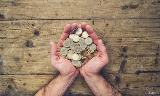 man hands holding a stack of euro coins, top view, with copy space  : Stock Photo or Stock Video Download rcfotostock photos, images and assets rcfotostock | RC Photo Stock.: