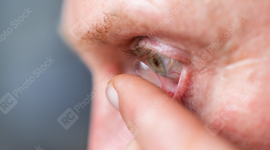 man putting contact lens in his right eye, close up  : Stock Photo or Stock Video Download rcfotostock photos, images and assets rcfotostock | RC Photo Stock.: