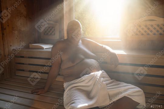 Man Relaxing in a Traditional Finnish Sauna  : Stock Photo or Stock Video Download rcfotostock photos, images and assets rcfotostock | RC Photo Stock.: