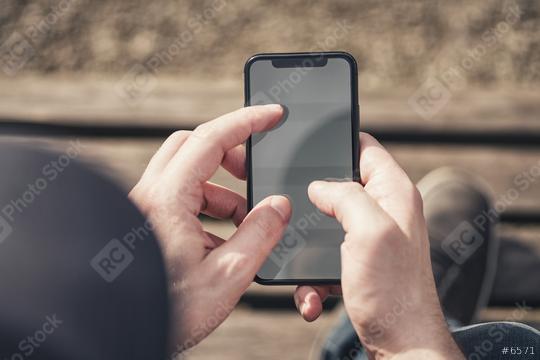 man using mobile smart phone at the streets  : Stock Photo or Stock Video Download rcfotostock photos, images and assets rcfotostock | RC Photo Stock.: