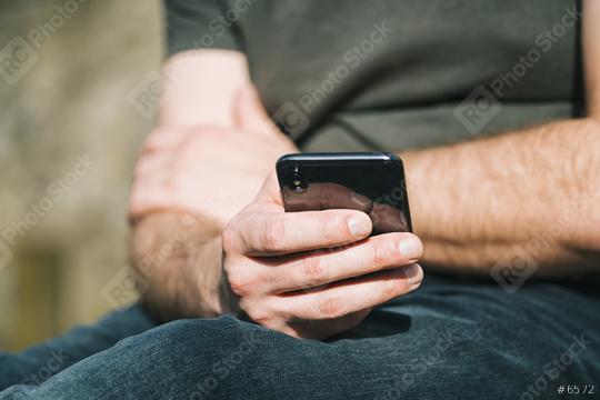man using mobile smart phone to play mobile games  : Stock Photo or Stock Video Download rcfotostock photos, images and assets rcfotostock | RC Photo Stock.: