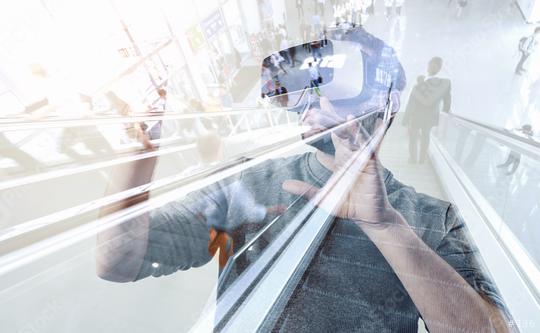 man wearing virtual reality headset on a games trade fair  : Stock Photo or Stock Video Download rcfotostock photos, images and assets rcfotostock | RC Photo Stock.:
