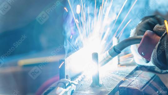 Man Welding steel  : Stock Photo or Stock Video Download rcfotostock photos, images and assets rcfotostock | RC Photo Stock.: