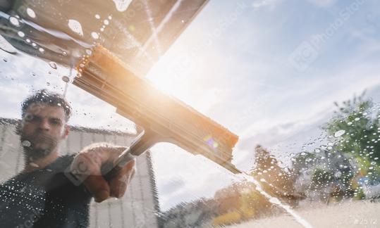 Man worker washing car with squeegee. car wash concept image. copyspace for your individual text.  : Stock Photo or Stock Video Download rcfotostock photos, images and assets rcfotostock | RC Photo Stock.: