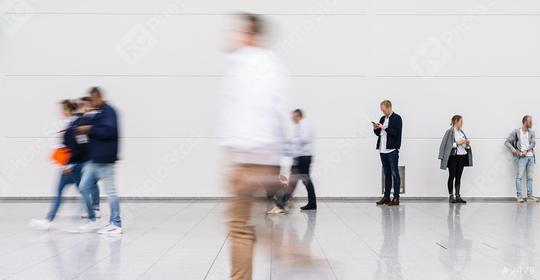 Many businessmen on the move at business trade fair or airport  : Stock Photo or Stock Video Download rcfotostock photos, images and assets rcfotostock | RC Photo Stock.: