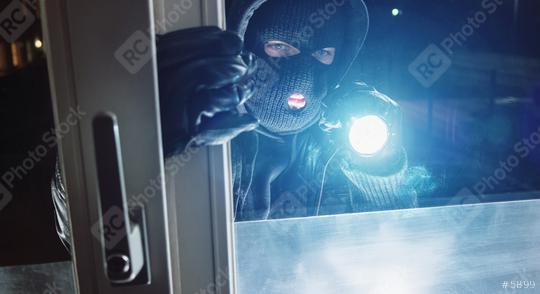 masked Burglar looking through window with flashlight at night  : Stock Photo or Stock Video Download rcfotostock photos, images and assets rcfotostock | RC Photo Stock.: