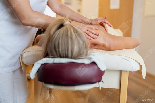 Massage therapist treating a female client’s back at a wellness spa. beauty salon Wellness Hotel Concept image  : Stock Photo or Stock Video Download rcfotostock photos, images and assets rcfotostock | RC Photo Stock.: