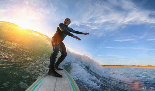 Mature senior adult surfing on a big wave in the ocean  : Stock Photo or Stock Video Download rcfotostock photos, images and assets rcfotostock | RC Photo Stock.: