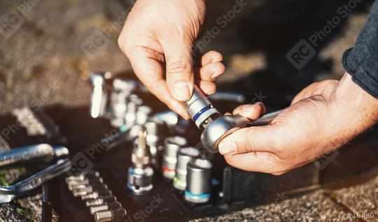 Mechanic working in garage. Repair service.  : Stock Photo or Stock Video Download rcfotostock photos, images and assets rcfotostock | RC Photo Stock.: