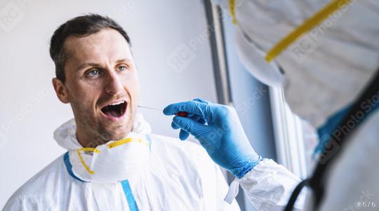 Medical professional in protective clothing takes swab test tube from mouth of a Exhausted clinician at a Covid-19 test center during coronavirus epidemic. PCR DNA testing protocol process.  : Stock Photo or Stock Video Download rcfotostock photos, images and assets rcfotostock | RC-Photo-Stock.: