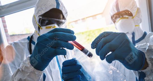 Medical professionals blood sample for Covid-19 test goes to the laboratory by employees in protective clothing  : Stock Photo or Stock Video Download rcfotostock photos, images and assets rcfotostock | RC Photo Stock.: