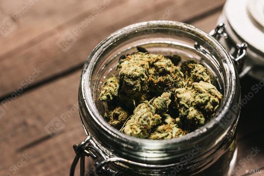 Medicinal Marijuana or Cannabis Buds in a jar  : Stock Photo or Stock Video Download rcfotostock photos, images and assets rcfotostock | RC Photo Stock.: