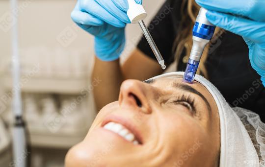Microneedle mesotherapy. Beautiful woman receiving microneedling  : Stock Photo or Stock Video Download rcfotostock photos, images and assets rcfotostock | RC Photo Stock.: