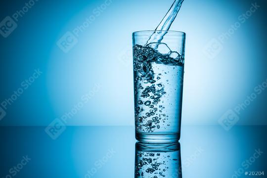 mineral water flows in to glass  : Stock Photo or Stock Video Download rcfotostock photos, images and assets rcfotostock | RC Photo Stock.: