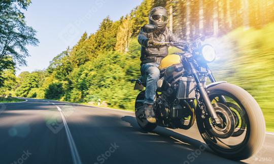 modern scrambler motorbike on the forest road riding. having fun driving the empty road on a motorcycle tour journey. Real dynamic motion blur shot. copyspace for your individual text.  : Stock Photo or Stock Video Download rcfotostock photos, images and assets rcfotostock | RC Photo Stock.: