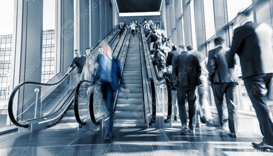Motion Blurred business on a escalator  : Stock Photo or Stock Video Download rcfotostock photos, images and assets rcfotostock | RC Photo Stock.: