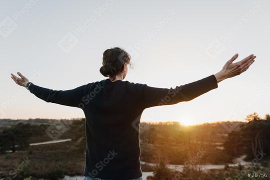 Motivated, cheerful person with outstretched, open arms in beautiful, relaxing nature. Woman feels freedom, motivation and has goals in life.  : Stock Photo or Stock Video Download rcfotostock photos, images and assets rcfotostock | RC Photo Stock.: