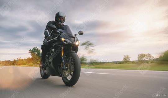 motorbike on the country road riding with motion speed. driving on the empty road on a motorcycle speed tour. copyspace for your individual text.  : Stock Photo or Stock Video Download rcfotostock photos, images and assets rcfotostock | RC Photo Stock.: