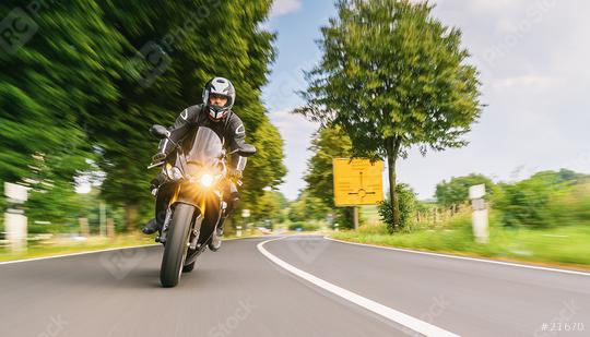 motorbike on the forest road driving. having fun driving the emp  : Stock Photo or Stock Video Download rcfotostock photos, images and assets rcfotostock | RC Photo Stock.: