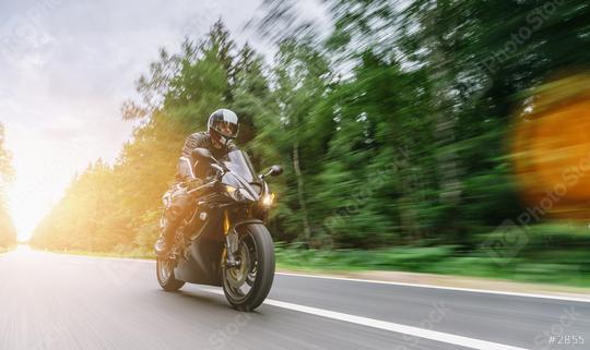 motorbike on the forest road riding. driving on the empty road on a motorcycle tour at sunset. copyspace for your individual text.  : Stock Photo or Stock Video Download rcfotostock photos, images and assets rcfotostock | RC Photo Stock.: