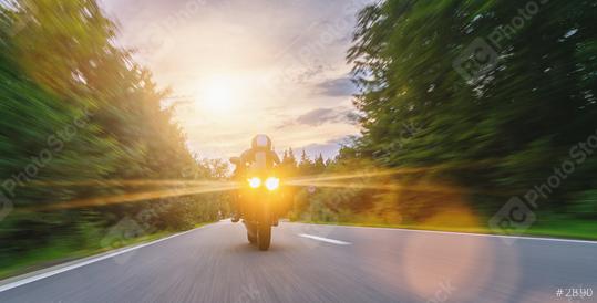 motorbike on the forest road riding. driving on the empty road on a motorcycle tour at sunset. copyspace for your individual text.  : Stock Photo or Stock Video Download rcfotostock photos, images and assets rcfotostock | RC Photo Stock.: