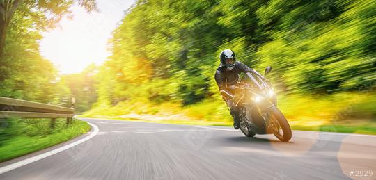 motorbike on the forest road riding fast. having fun driving on the empty road.  : Stock Photo or Stock Video Download rcfotostock photos, images and assets rcfotostock | RC Photo Stock.: