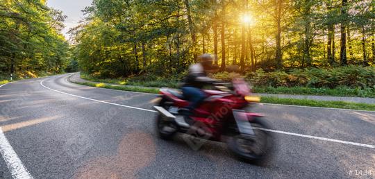 motorbike on the forest road riding fast. having fun driving the empty road on a motorcycle tour journey. copyspace for your individual text.  : Stock Photo or Stock Video Download rcfotostock photos, images and assets rcfotostock | RC Photo Stock.: