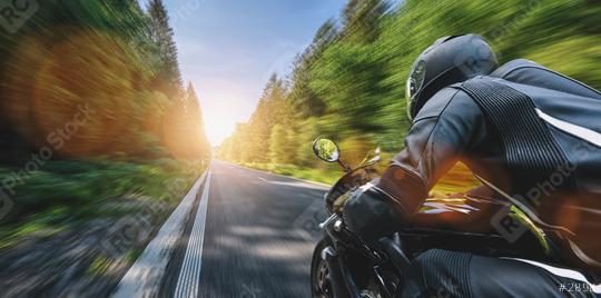 motorbike on the road driving fast. having fun on the empty highway on a motorcycle journey.   : Stock Photo or Stock Video Download rcfotostock photos, images and assets rcfotostock | RC Photo Stock.: